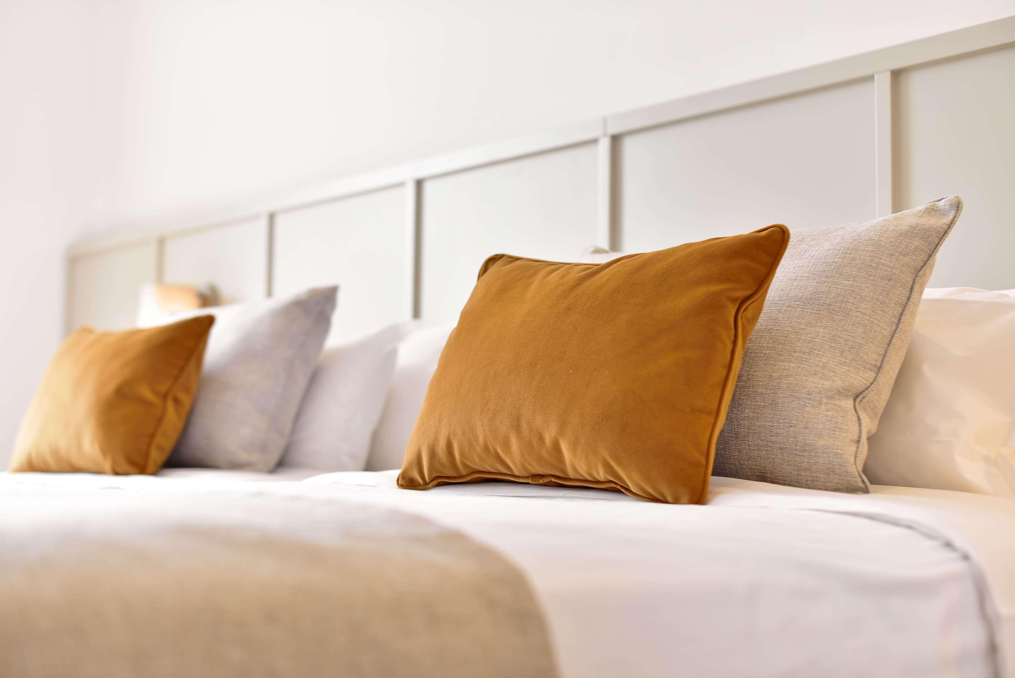 โดลเช บาย วินด์แฮม กัมโปเรอัล ลิสบัว Hotel ตูร์ซิฟาล ภายนอก รูปภาพ Pillows on a bed