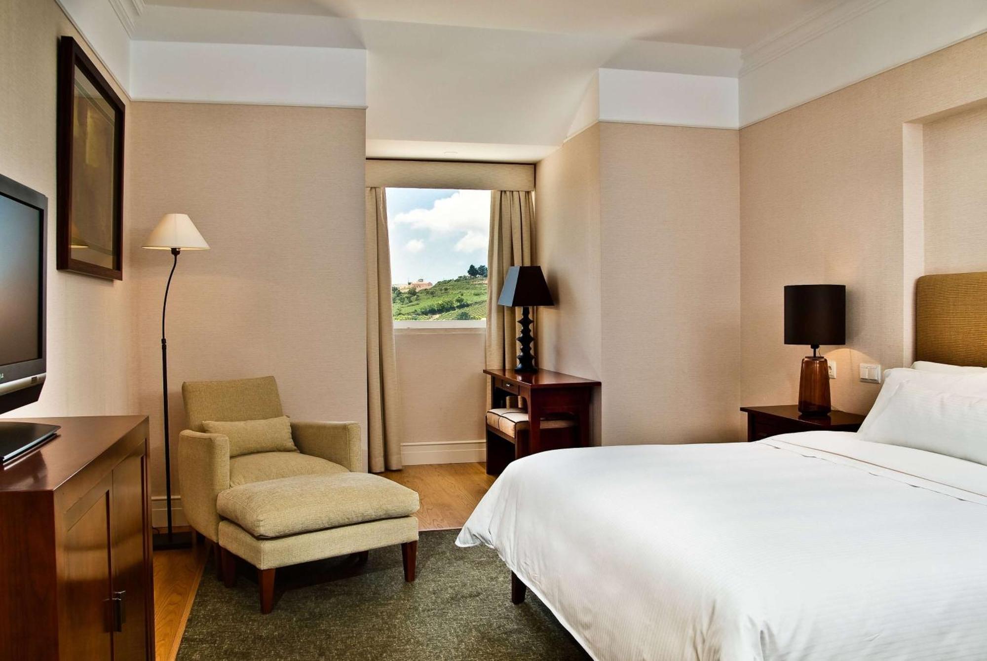 โดลเช บาย วินด์แฮม กัมโปเรอัล ลิสบัว Hotel ตูร์ซิฟาล ภายนอก รูปภาพ A room at the hotel